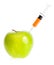 Apple with syringe