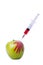 Apple with syringe