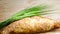 Apple turnover with crop barley on wooden background