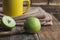 Apple, yellow rural mug with hot drink