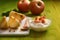 Apple yogurt in the glass bowl with fruit around