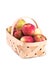 Appleas heaped in a wooden basket,