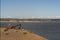 APPLEDORE, DEVON, UK - JULY 11 2020: Family enjoying day out sat by the anchor