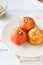 Apples baked in a plate on white napkin