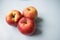 Apples on blue background in the kitchen