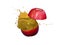 The apples is cut into two parts and the apple juice is splash on white background
