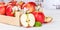 Apples fruits red apple fruit banner box on wooden board with leaves and blossoms