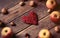 Apples, heart shaped toy, fir-cone and nuts