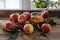 Apples with honey, leaves on the wooden table