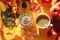 Apples, nuts, foliage, rose hips with a Cup of cocoa and cake in the sun and shadows from objects, top view