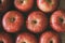 Apples red ripe fruits background texture. Apple harvest concept.