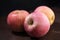 Apples on wooden table.