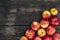 Apples on wooden table background. Fresh fruit backdrop with empty space for text