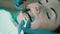 Application of bleaching gel for procedure of teeth whitening