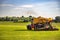 Application of manure on arable farmland with the heavy tractor