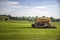 Application of manure on arable farmland with the heavy tractor