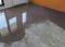 Application of self leveling screed over cement floor. Apartment