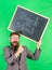 Apply for sensational educational offer. Man bearded teacher holds blackboard back to school inscription on green