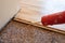 Applying sealant to parquet before laying the floor