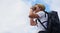 Appreciating miles of natural beauty. a young man with binoculars hiking outdoors.