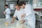 Apprentice chef preparing food in kitchen at restaurant