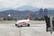 Approaching aircraft with jetbridge in Taipei Song Shan Airport