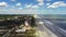 Approaching Jacksonville Beach fishing pier from south aerial drone shot