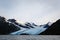 Approaching Portage glacier from lake in Alaskan wilderness in summer
