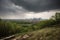 approaching storm clouds, with view of city skyline visible in the distance