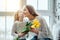 Ðappy mothers day!Child congratulates mother and gives a bouquet of flowers to tulips