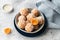 apricot bliss balls in blue bowl