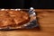 Apricot cake baked in foil on a wooden table. tasty pie food photo