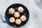 apricot coconut protein balls in blue bowl