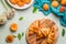 Apricot croissants on kitchen table with fresh apricot bunch , top view