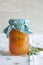 Apricot jam with thyme in a jar
