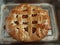 Apricot pie on metal plate. Homemade tasty fruit pie.