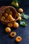 Apricots in a basket on black background