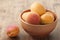 Apricots in a clay bowl