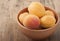 Apricots in a clay bowl