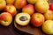 Apricots fruit on wooden table. Vitamin fruits