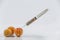 Apricots and syringe with pills