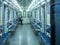April 2020, Moscow, metro. Empty subway cars. Moscow is in quarantine. Lonely passenger in a disposable mask and latex gloves in