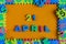 April 21st. Day 21 of month, daily calendar of child toy puzzle on orange background. Spring time theme