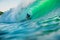 April 25, 2019. Bali, Indonesia. Surfer ride on barrel wave. Professional surfing with ideal ocean waves at Bingin beach