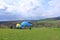 April 25 2021 - Dresden/Germany: Paragliders taking off in front of a green hill