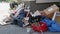 April 27, 2021 - Kehl, Germany: Large heaps of household rubbish, furniture, belongings, household items lie on street