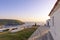 April 28th 2019 - Agios Efstratios island, Greece - The cemetery of the island, overlooking the harbor, in warm sunset colors