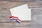 April 30 . three mini-flags with two sheets of white paper. The concept of independence Day of the Netherlands and the National