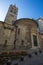 The apse and the bell tower of the Convent of San Giovanni di PrÃ¨ La Commenda inside the historic centre of city of Genoa, Italy