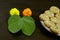 Apta leaf with Marigold flowers and sweet, a concept for Dussehara or Vijayadashami, an Indian festival